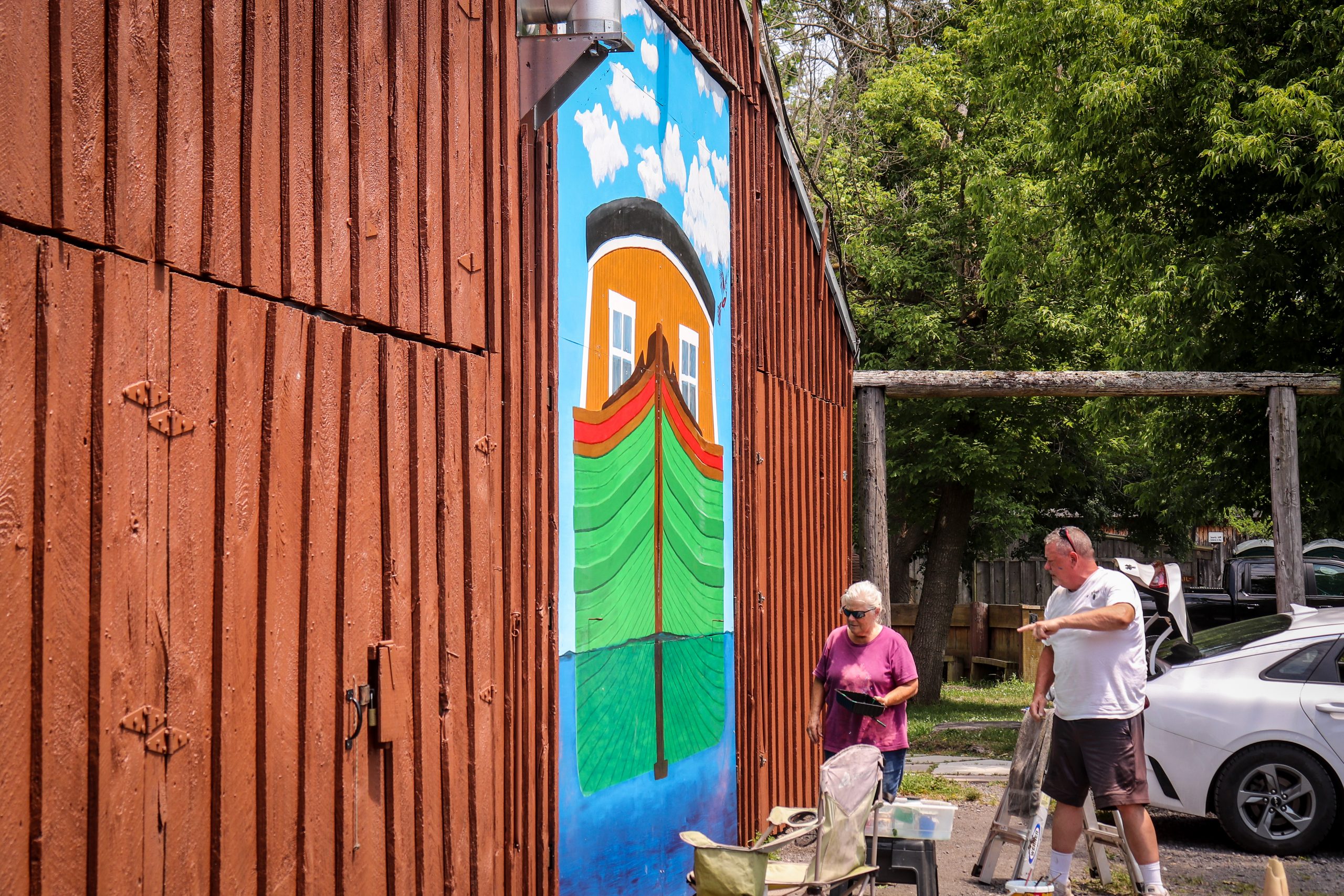 Artist Beverly Owen painting the latest mural from the Mural Mania art mission at the Liz and Dave Beebe Camillus Erie Canal Park in Onondaga County on Thursday, June 20.
