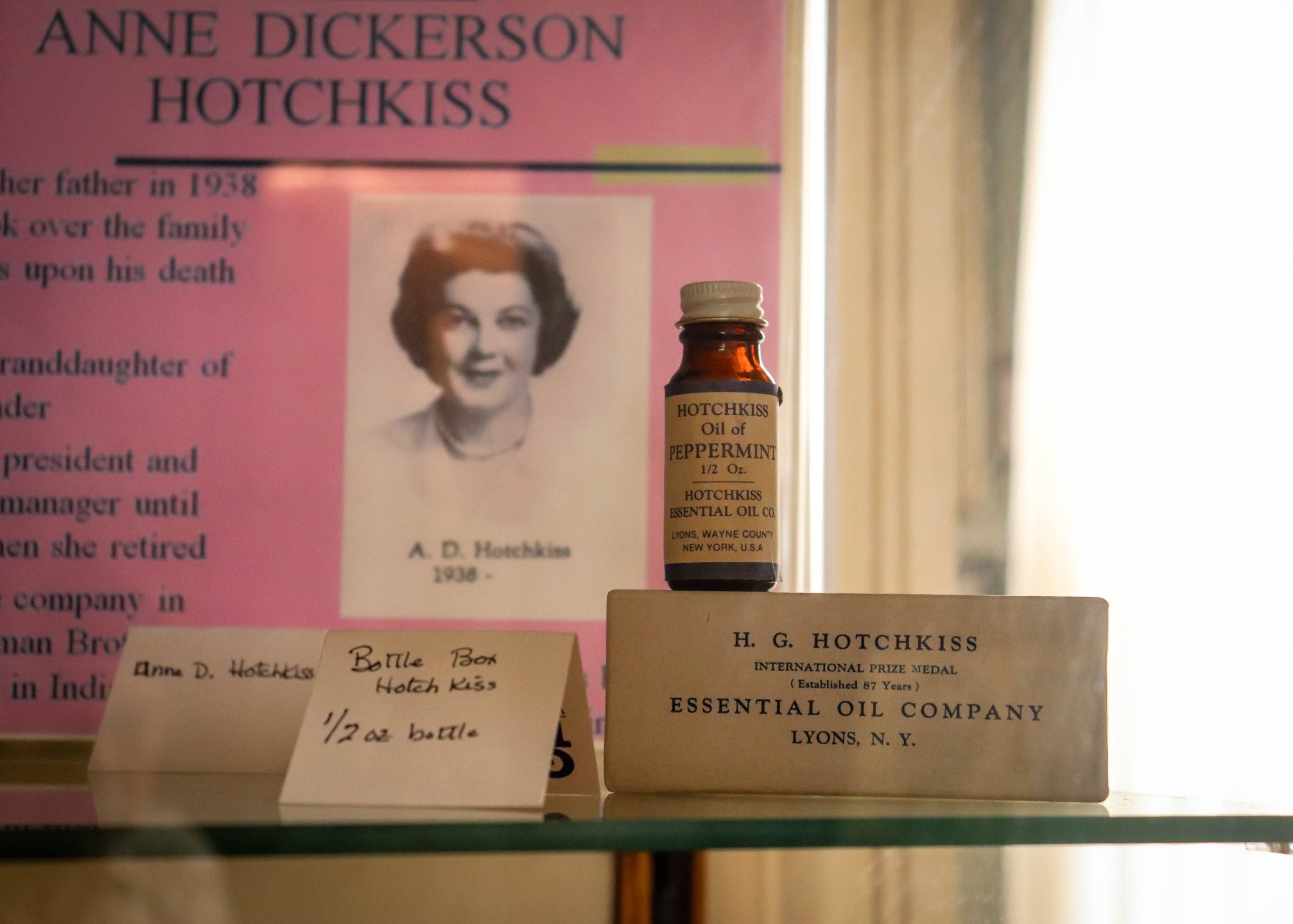 Original 1/2 ounce bottle of peppermint oil from the H.G. Hotchkiss Essential Oil Company, preserved among historical artifacts at the Peppermint Museum in Lyons, New York.
