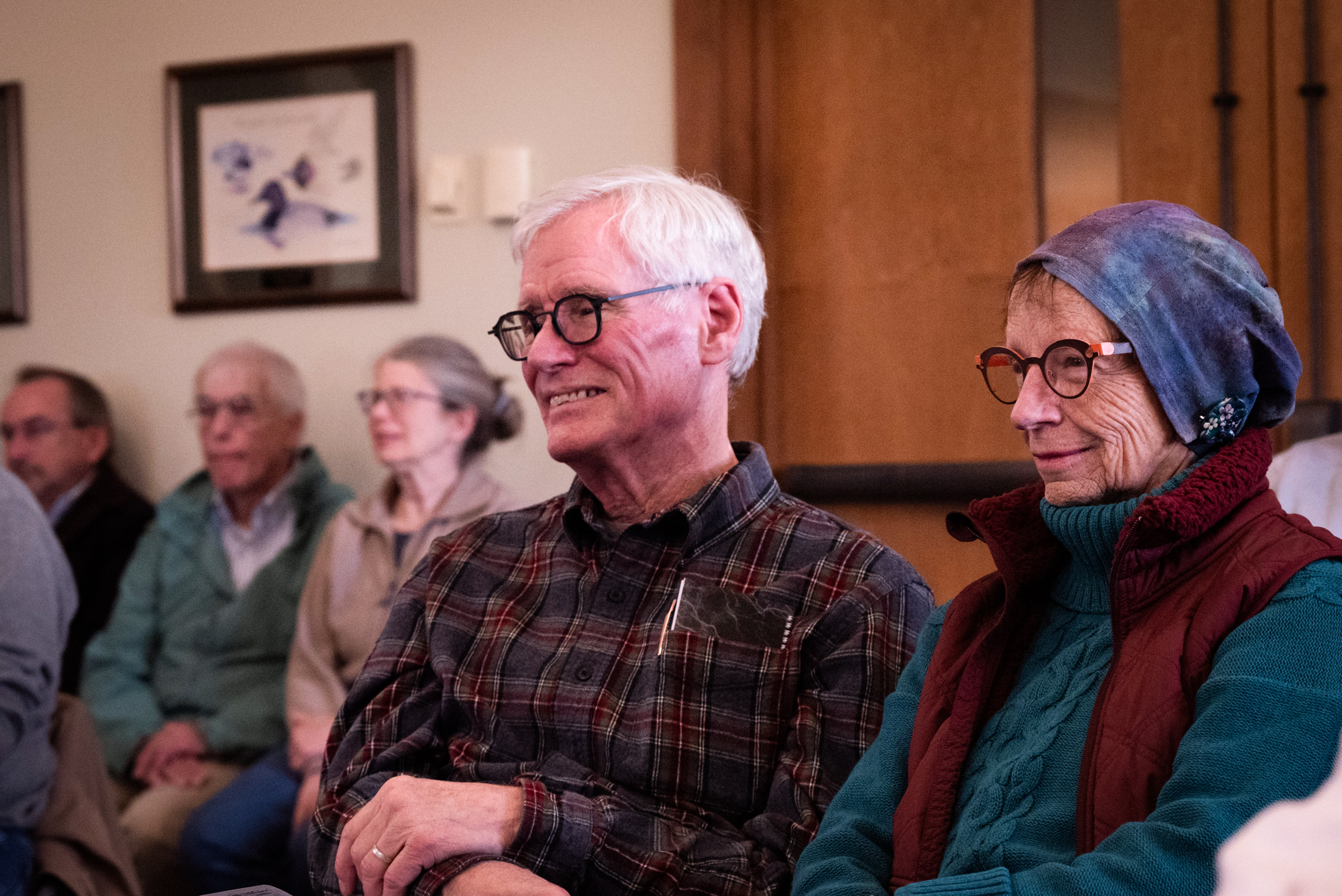 Attendees listen to the performance of 