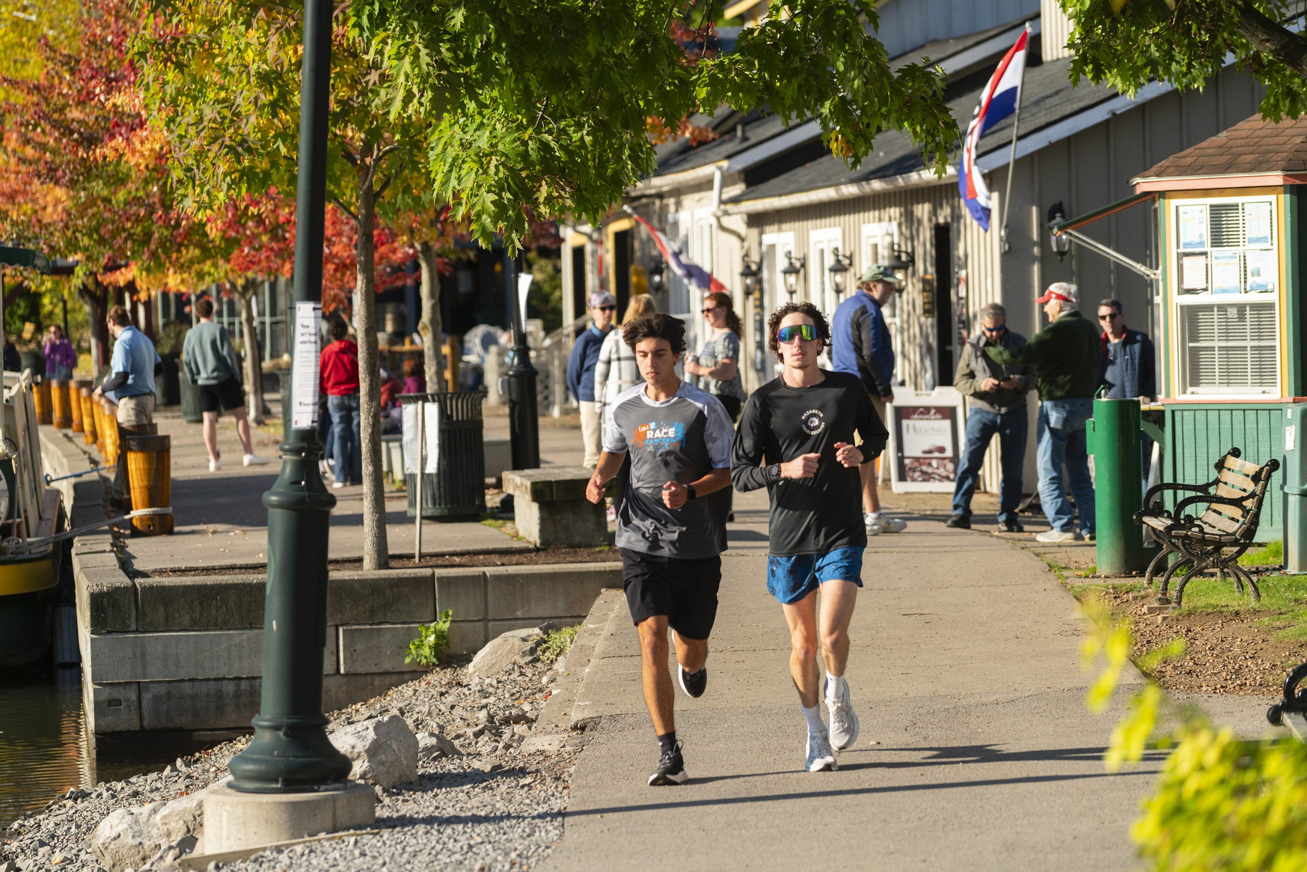 Runners exercise alongside the Erie Canal wateray in Pittsford, New York.